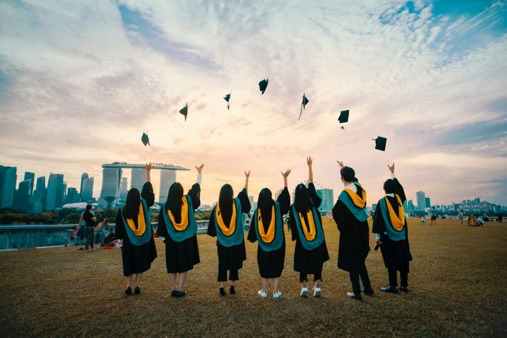 Top 5 Master’s Programs for Home Décor Enthusiasts 1 people throwing hats on air