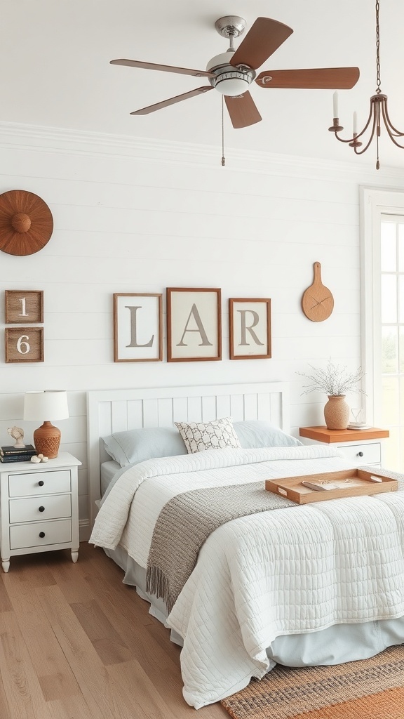 14 Stunning White Bedroom Ideas for a Dreamy Retreat 22 A modern farmhouse bedroom featuring white walls, a cozy bed with neutral bedding, wooden accents, and decorative wall art.
